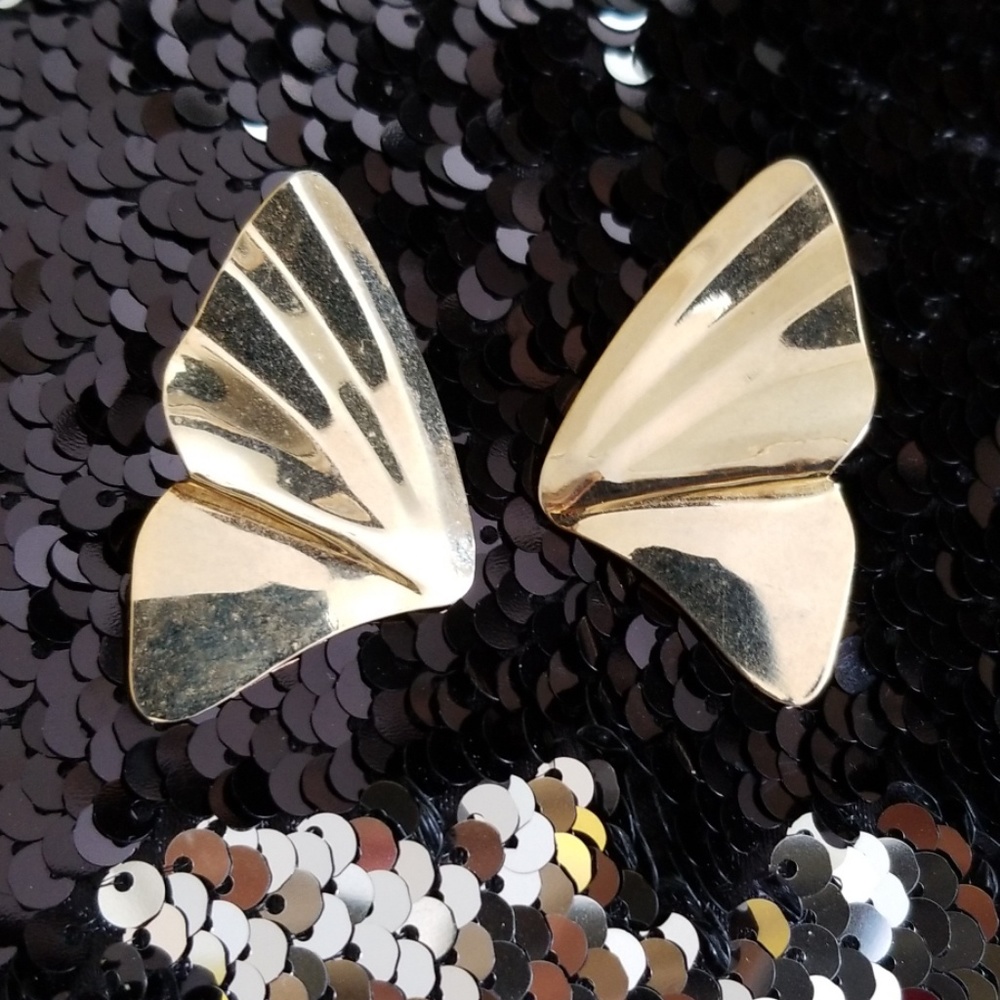 Gold costume earrings.